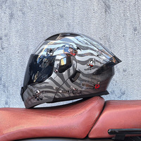 Nouveau modèle de casque de moto rabattable pour hommes et femmes en toutes saisons