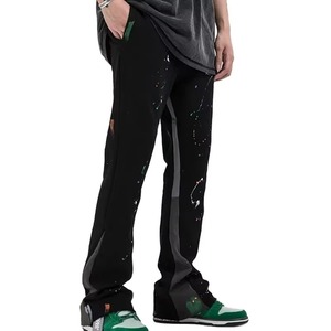 Pantalon de survêtement pour homme à effet peinture graffiti, patchwork, cordon de serrage, coupe évasée, style décontracté - Product Image 1