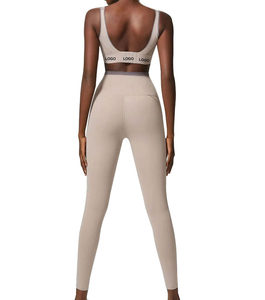 Leggings de cintura alta para mujer, de color sólido, elásticos, sin costuras, estilo deportivo, con logo en la pierna derecha. - Product Image 6