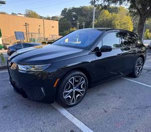 Tout nouveau SUV électrique iX xDrive50 à double moteur et transmission intégrale 2025 - 516 ch, intérieur en cuir luxueux, véhicule utilitaire familial ultime - Product Image 1