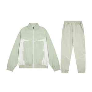 Conjunto de Chaqueta y Pantalones Impermeables con Capucha, Traje Deportivo Informal Personalizado, Ropa Deportiva para Exteriores de Fábrica OEM - Product Image 1