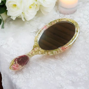 Miroir à main en résine avec finition lisse et brillante, parfait pour un usage quotidien, le maquillage ou des fins décoratives, ajoutant une touche élégante - Product Image 1