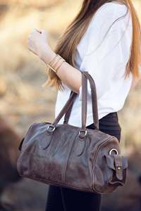 Black Genuine <b>Leather</b> Barrel <b>Bag</b> With Ruffles Buckle Closure Minimalist Design Unisex Daily Use - Product Image 4