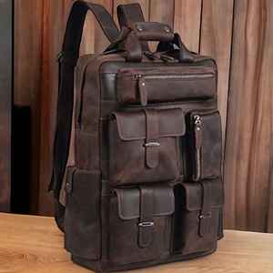 Mochila de cuero marrón retro hecha a mano con múltiples bolsillos y cierres de cremallera duraderos - Product Image 1