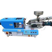 Machine de moulage par injection électrique avec système hydraulique