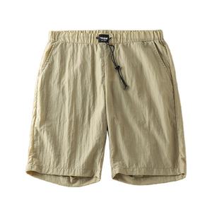 Pantalones cortos ajustados informales de verano de tela suave de poliéster de punto con cintura elástica transpirable para hombre OEM - Product Image 1