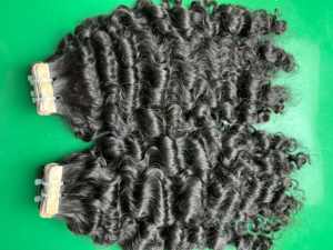 Extensiones de cabello natural vietnamita Cinta rizada birmana cruda-En sin enredos Sin desprendimiento con color de cabello natural - Product Image 2