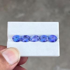 พลอยแทนซาไนต์สีน้ำเงินทรงรีเจียระไนแบบธรรมชาติผ่านการอบความร้อน  รับรองโดยผู้ตรวจสอบอิสระ สำหรับทำเครื่องประดับ ขนาด 1-2 กะรัต - Product Image 1