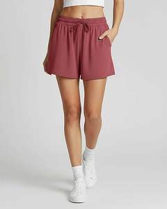 Prix direct usine, qualité supérieure, shorts respirants pour femmes, logo brodé personnalisé, 100% coton, coupe ajustée, sportifs, boutonnés - Product Image 1