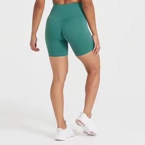 Venta al por mayor de las mujeres sin costuras de levantamiento de cadera entrenamiento Fitness Shorts estilo atlético de cintura alta de secado rápido pantalones cortos de yoga con bolsillos - Product Image 5