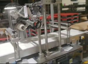 Machine semi-automatique d'emballage plastique automatique pour bière alimentaire sac kraft ligne complète moteur à noyau de jus d'eau pour lait en poudre - Product Image 5