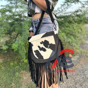 Nuevo estilo occidental pelo en piel oculta bolsos con flecos de cuero genuino de alta calidad estilo bohemio mujeres bolsos cruzados con flecos de cuero Real - Product Image 1