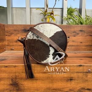 Nouveau Style occidental cheveux sur cacher fourrure cuir rond cantine sac haute qualité à la mode fourrure cuir fermeture éclair circulaire fronde sacs - Product Image 1