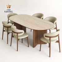 Table à manger en bois massif de luxe Vantel et chaises en cuir pour projets de mobilier de villa haut de gamme, fournisseur B2B