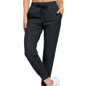 Pantalones de pierna ancha de talla grande transpirables para mujer, Pantalones de mujer al por mayor, pantalones informales con cordón en la cintura para mujer - Product Image 1