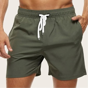 Shorts de plage pour hommes, nouvelle collection été, haute qualité, en toile, séchage rapide, respirant, élastique, polyvalent, style décontracté urbain, couleur unie - Product Image 3