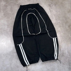 Nouveau pantalon en nylon unisexe coupe ample avec ourlet coupe-vent, coupe régulière, jambe large, nylon - Product Image 2