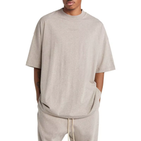 T-shirt décontracté oversize pour homme 100% coton tricoté respirant à manches courtes col rond avec logo personnalisé sur le devant Prix usine