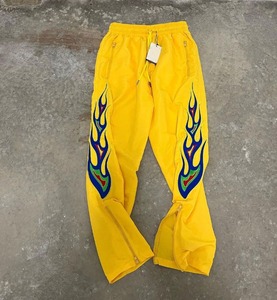 Cortavientos de calle con bordado y logotipo personalizado para hombre, pantalones impermeables transpirables, parte inferior abierta, poliéster, nailon, pista acampanada - Product Image 5