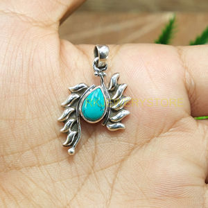 Pendentif artisanal en argent sterling 925 avec turquoise naturelle en forme de feuille, bijoux en argent tribal bohème artisanal pour la vente en gros - Product Image 4