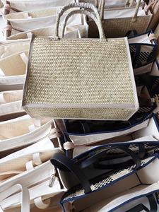 กระเป๋าถือหญ้าทะเลทาสีธรรมชาติ/ กระเป๋าหัตถกรรมทําจากหญ้า เป็นมิตรกับสิ่งแวดล้อมและแฟชั่นจากเวียดนาม - Product Image 2