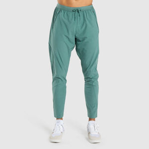 Vente en gros de pantalons de survêtement pour hommes taille haute moyenne pantalons de sport confortables impression de logo personnalisé nouveau tissu de toile de coton - Product Image 1