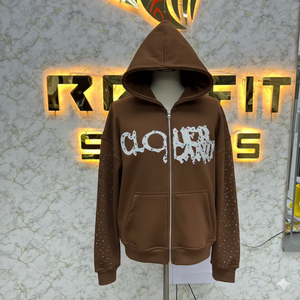 เสื้อฮู้ดซิปสีส้มโคลเวอร์ ยูนิเซ็กส์ สตรีทแวร์ ผ้าฟลีซ โอเวอร์ไซส์ พิมพ์ลายโลโก้ด้านหน้าประดับคริสตัล แขนเสื้อปกติ สำหรับฤดูใบไม้ร่วง - Product Image 3