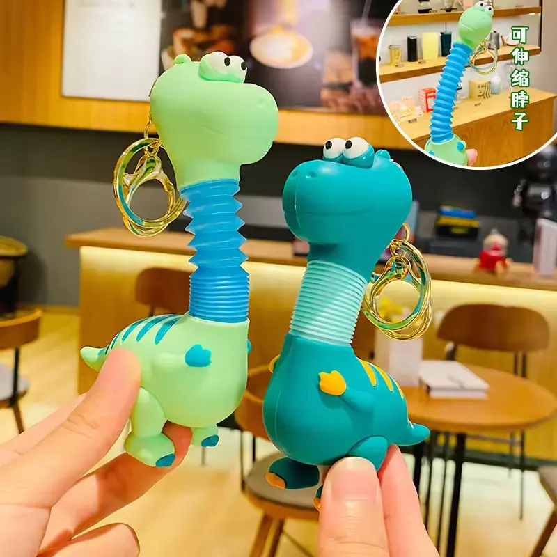 Retractable Dinosaur Keychain Spring dinosaur toy Key chains cute pendant bag kids gifts Car keyring Cartoon PVC dragon Keychain