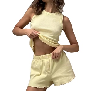 Combinaison de gymnastique d'été pour femmes, couleur unie, tissu doux, deux pièces, ensemble de yoga, vêtements de sport respirants pour la course à pied. - Product Image 1