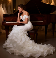 Robe de mariée sirène à épaules dénudées avec perles et jupe en organza à volants