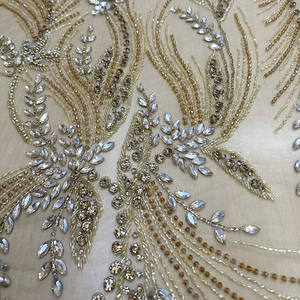 Luxury 100% Polyester Champagne Crystal Leaf Embroidered Woven Lace Fabric Breathable Lightweight Sheer with Free Sample - Product Image 1