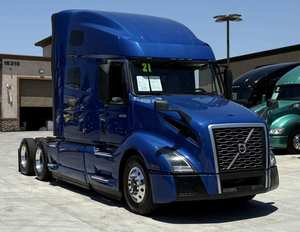 ซื้อเลย รถบรรทุกหัวลากมือสอง ปี 2021 รุ่น VNL64T760 พร้อมเตียงนอน - เครื่องยนต์ D13 425 แรงม้า เกียร์อัตโนมัติ 12 สปีด พร้อมส่งทั่วโลก ส่งถึงบ้าน - Product Image 1