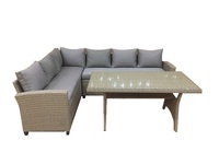 Ensemble de mobilier de restaurant moderne 7 places pour l'extérieur, table en rotin PE de haute qualité avec plateau en verre et chaises pour usage commercial