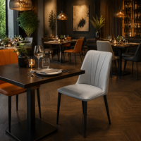 Chaise de salle à manger en cuir capitonnée Channel