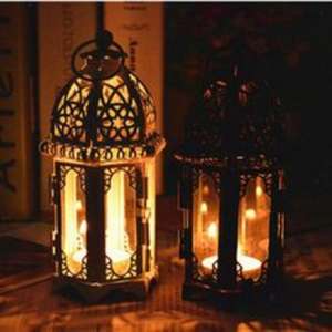 <b>Moroccan</b>-inspired iron <b>lantern</b> with stunning arabesque detailing and antique bronze finished for exotic ambiance - Product Image 3
