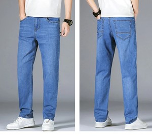 Ropa de calle para hombres y mujeres, pantalones vaqueros serigrafiados, pantalones vaqueros lavados de cintura media de corte regular vintage sólido - Product Image 1