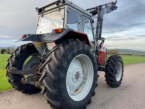 Massey Ferguson 399 con cargador autonivelante Quick 660 en venta - Product Image 4