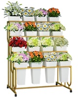 Présentoir de fleurs en métal avec 16 seaux à fleurs Support pour plantes à 4 niveaux avec chariot à 4 roues pour jardinière intérieure et extérieure avec support