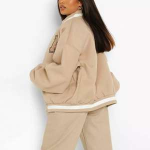 Veste universitaire coupe-vent pour femme de qualité supérieure 100% laine Logo personnalisé grande taille respirant et col montant pour l'automne - Product Image 4