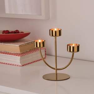 Modern Minimalist Metal Taper Holder For Offices <b>Offering</b> Sleek Contemporary Design With Luxurious Golden Finish - Product Image 1