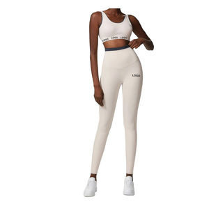 Ventes chaudes 2025, ensembles de yoga pour femmes, taille haute, logo sur le devant, ensemble de leggings de sport deux pièces, spandex/nylon - Product Image 1