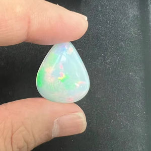 Ópalo Etíope de Calidad AA, Cabujón de 12.06 Quilates, Blanco Natural, Forma de Pera, Gema Suelta con Juego de Color/Fuego, Valoración por Terceros - Product Image 1