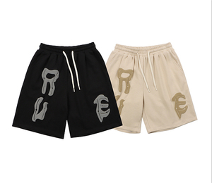 Shorts de sport amples pour hommes, personnalisés avec logo, en polyester épais 100 %, taille élastique, respirants, séchage rapide, couleur unie, haute qualité - Product Image 1