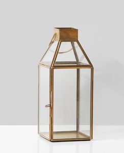Farol de metal de estilo industrial con construcción de hierro duradera y paneles de vidrio transparente para iluminación decorativa comercial - Product Image 1