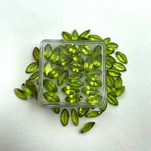 พลอยเพอริดอทดิบสีเขียวธรรมชาติ 100% รูปทรงมาร์คีส์ จำนวน 20 เม็ด ขนาด 5x10 มม. น้ำหนัก 20 กะรัต แบบตาแมว ขายส่ง - Product Image 4