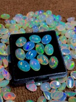 Opale blanche éthiopienne de qualité AA supérieure, naturelle, taille brillant, cabochon, authentique, en vrac, 5x7mm, 0,20-1 carat, avec jeu de couleurs/effet de feu, troisième niveau