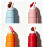 Baume à lèvres personnalisé en silicone souple avec beurre de macadamia, peptides et collagène, sérum huileux végétalien en tube souple