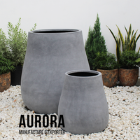 Les jardinières et les Pots de jardin de fleurs en fibre de pierre d'un fournisseur professionnel sont populaires au Vietnam pour la décoration de la maison et du jardin