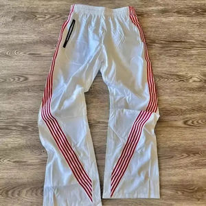 Pantalones de chándal rectos a rayas altas para hombre, cintura elástica, ajuste holgado con diseño a rayas, Pantalones rectos a rayas curvas para hombre OEM - Product Image 5