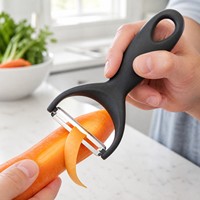 Grijze Y-vormige schilmes van roestvrij staal, draaibaar, voor groenten en fruit, ergonomische handgreep, keukenhulp voor voedselbereiding, groothandel.